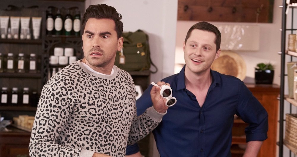 David surprised to see someone while Stevie smiles with arms on his waist.