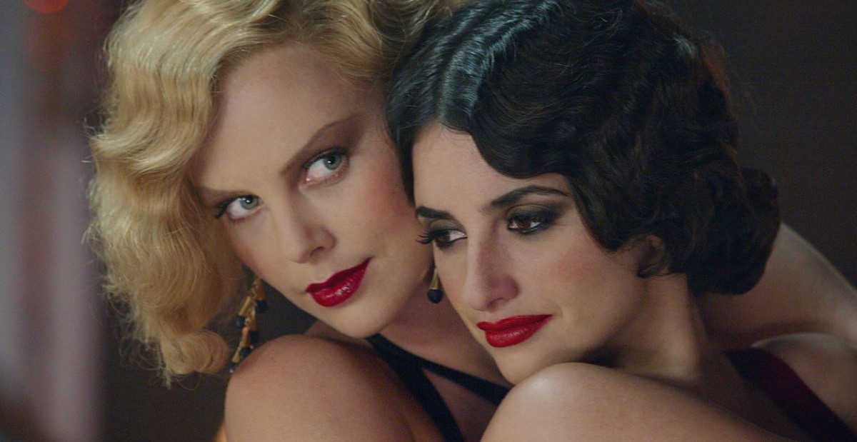 Gilda and Mia cheek to cheek holding eachother.