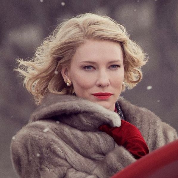 Carol looking longingly at Therese as she walks away.