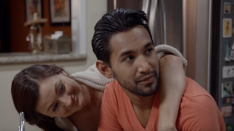 Lily and Caden look over at Beau out of frame. Lily has her arm over Caden with a playful expression.