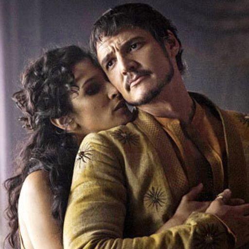 Ellaria behind Oberyn hugging him while he looks to the side wincing.