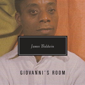 Book cover of Giovanni's Room, with Gio on the cover wearing a button up and smiling.