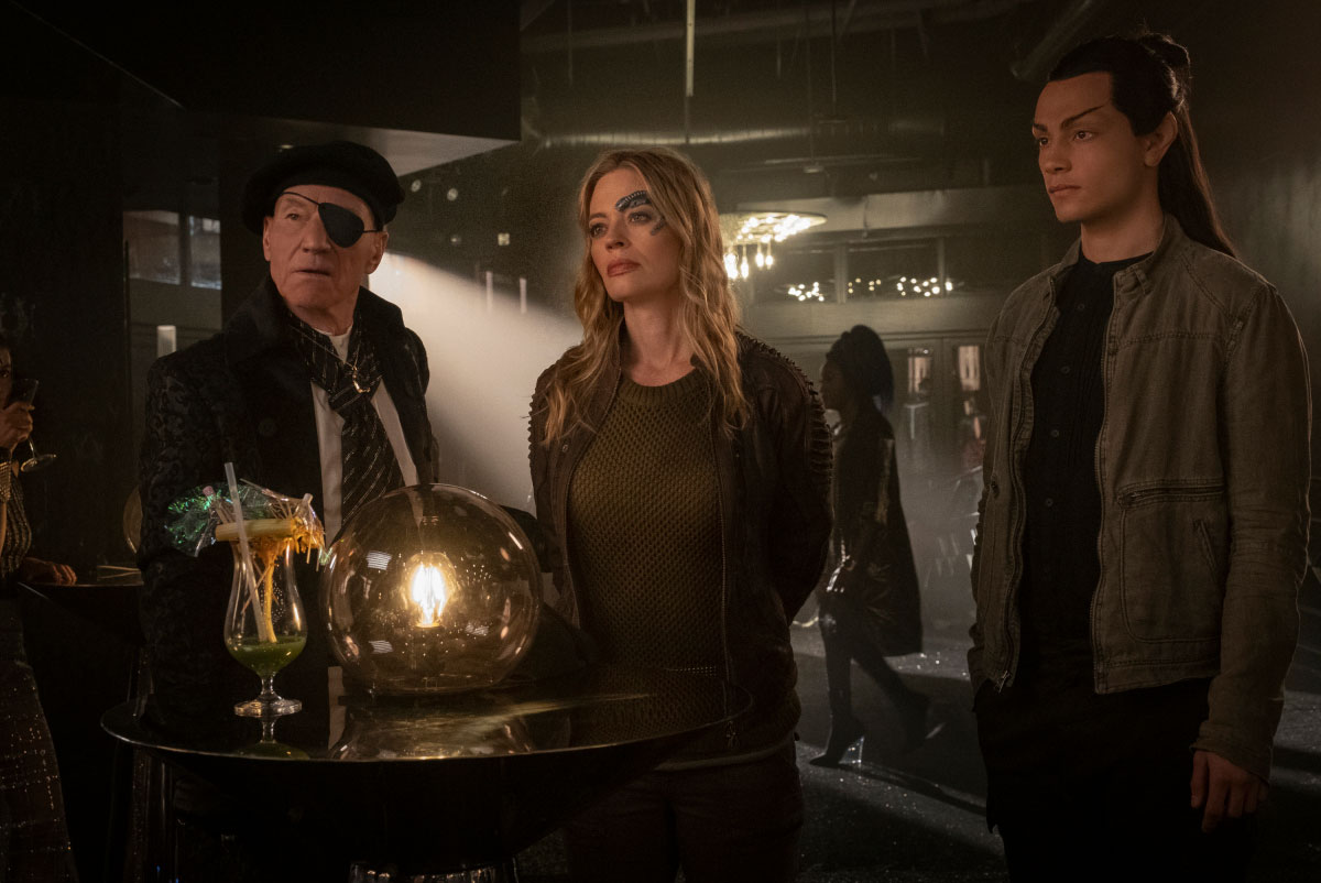 Picard, Seven, and Elnor. Picard is disguised as they go undercover on the planet Freecloud.