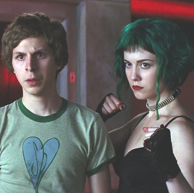 Scott and Ramona and Knives Chau a secondary character standing side by side ready to fight an unseen opponent. Ramona has her fists up.