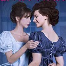 Book cover of two women wearing dresses embrace. Both are smiling and looking at eachother.