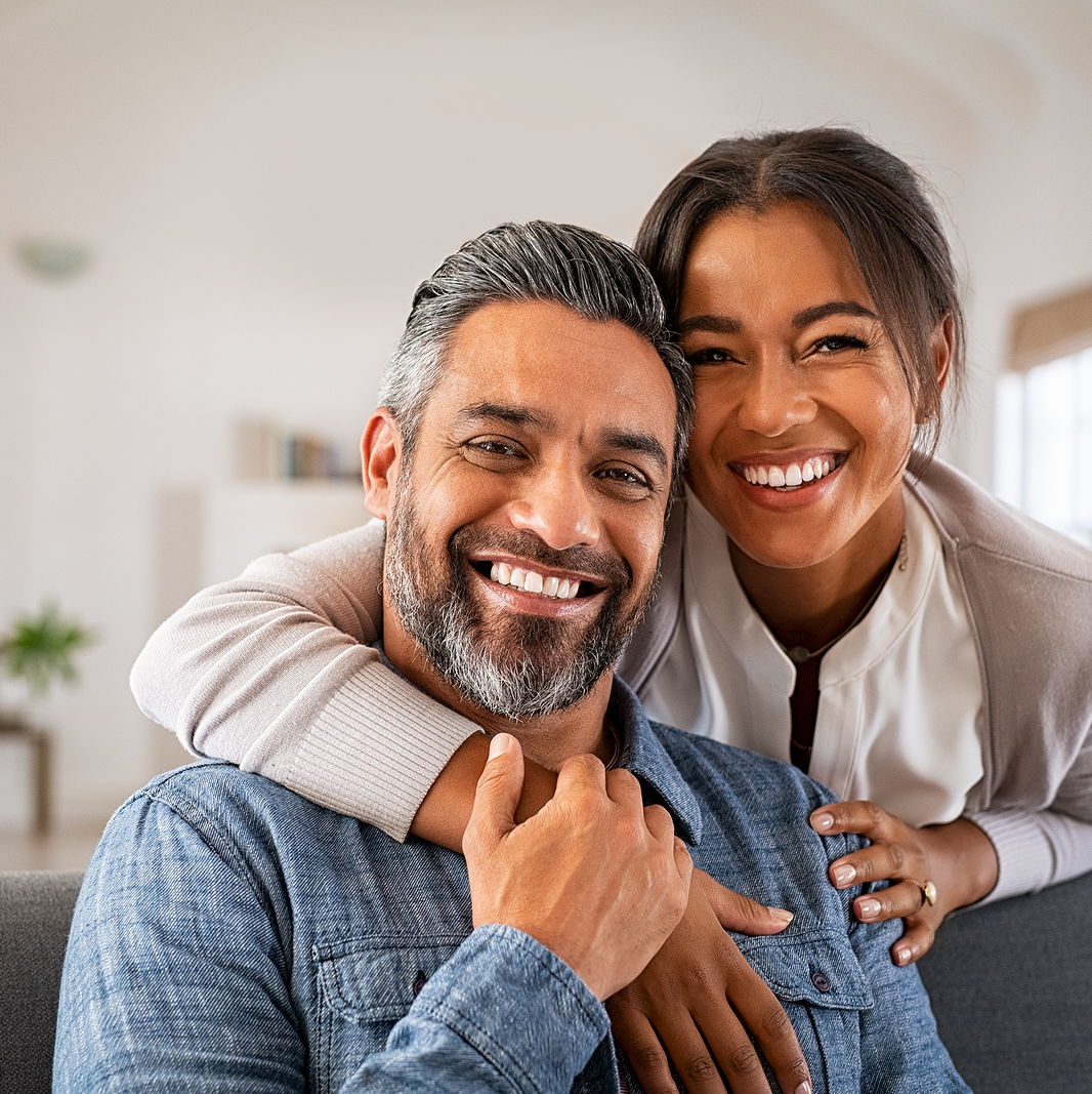 A model photograph of Lewis Oakley standing confidently in the middle of a street wearing dark clothing