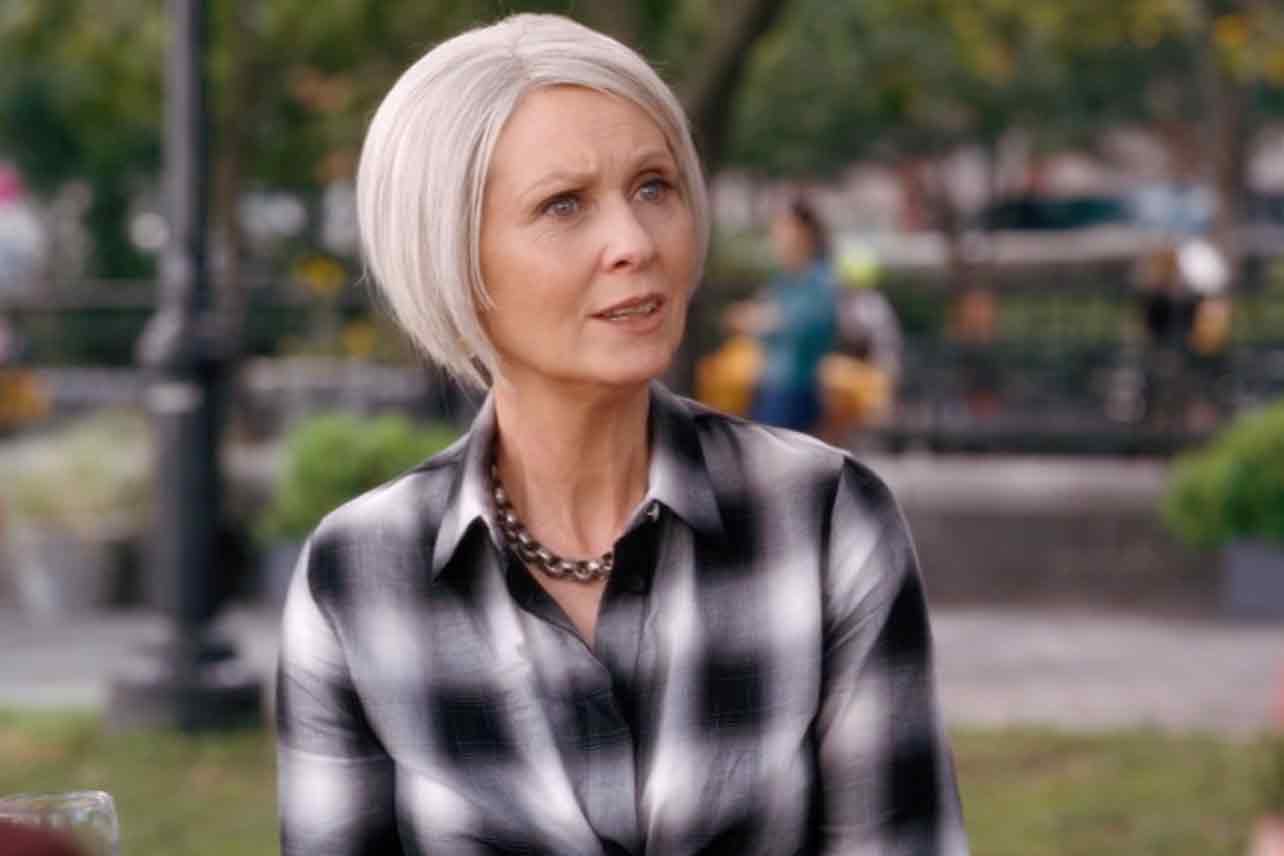 Miranda has an annoyed expression while looking at someone out of frame while at a park.