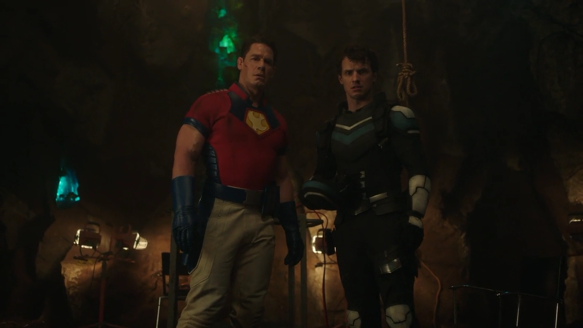 Peacemaker and Vigilante standing confidently looking at someone out of frame.