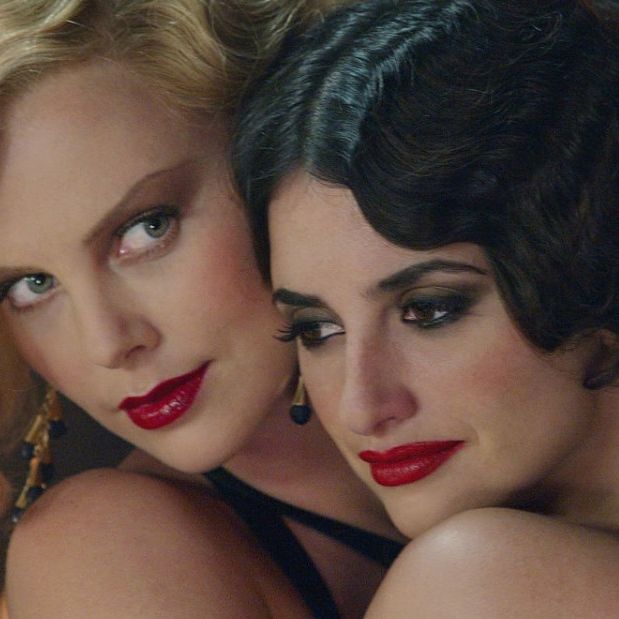 Gilda and Mia cheek to cheek holding eachother.